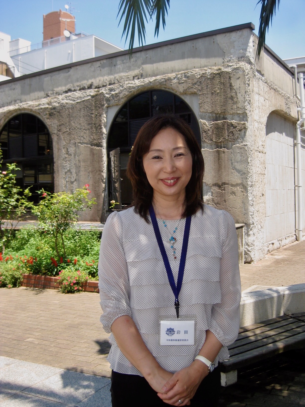 Iwata Miho outside a historic building at Honkawa Elementary School (2009).